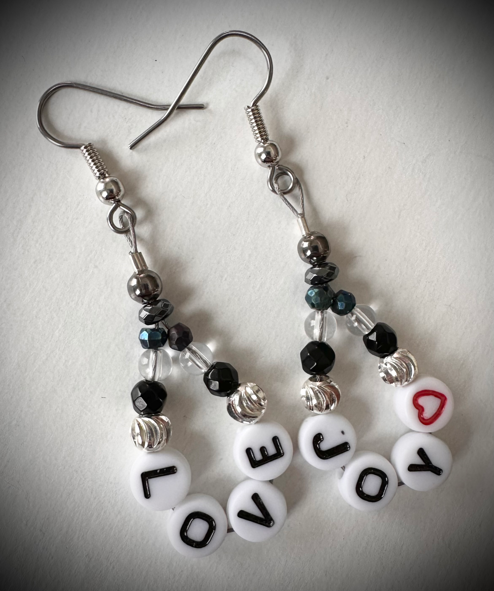 Love & Joy, Quartz Crystal, Black Onyx, Spinel and Hematite on Stainless Steel