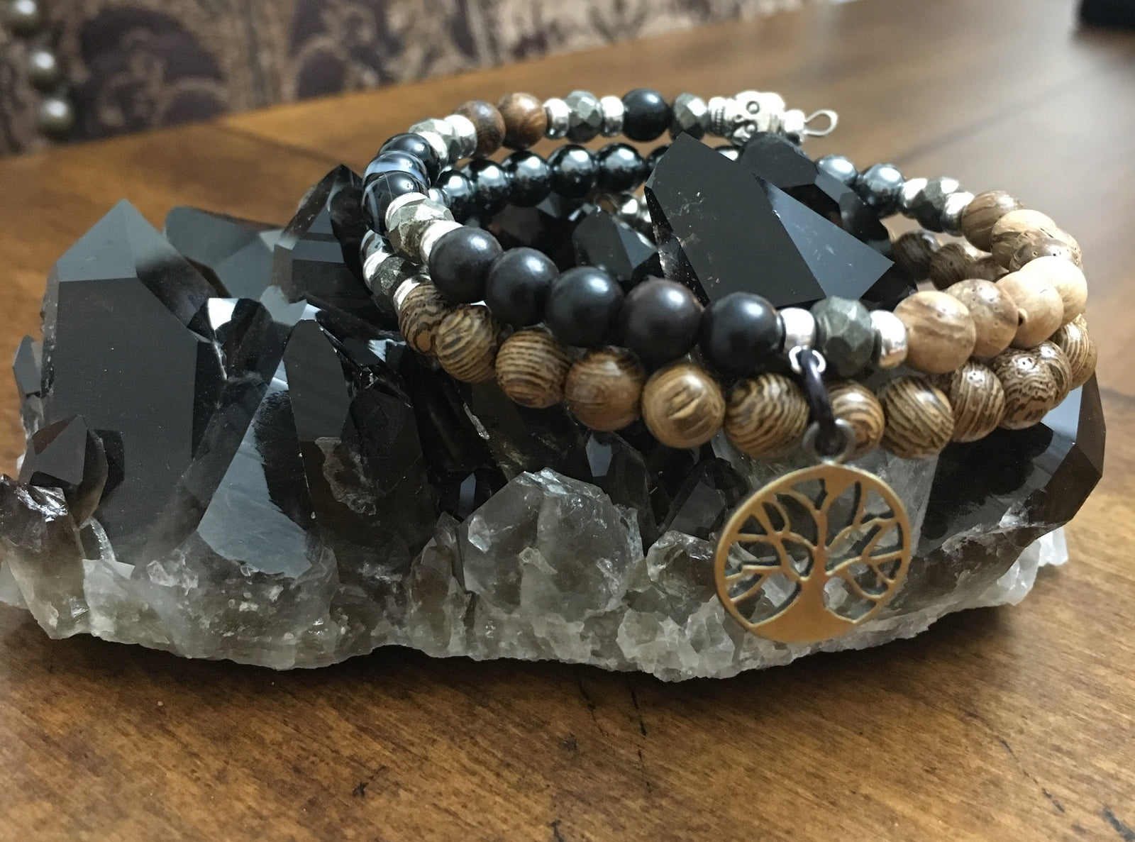Rainbow Obsidian, Tiger Skin Sandalwood, Black Agate Dyed, Black Sandalwood, Agarwood, Hematite, Wenge Wood, and Pyrite Bracelet in Fibonacci Sequence