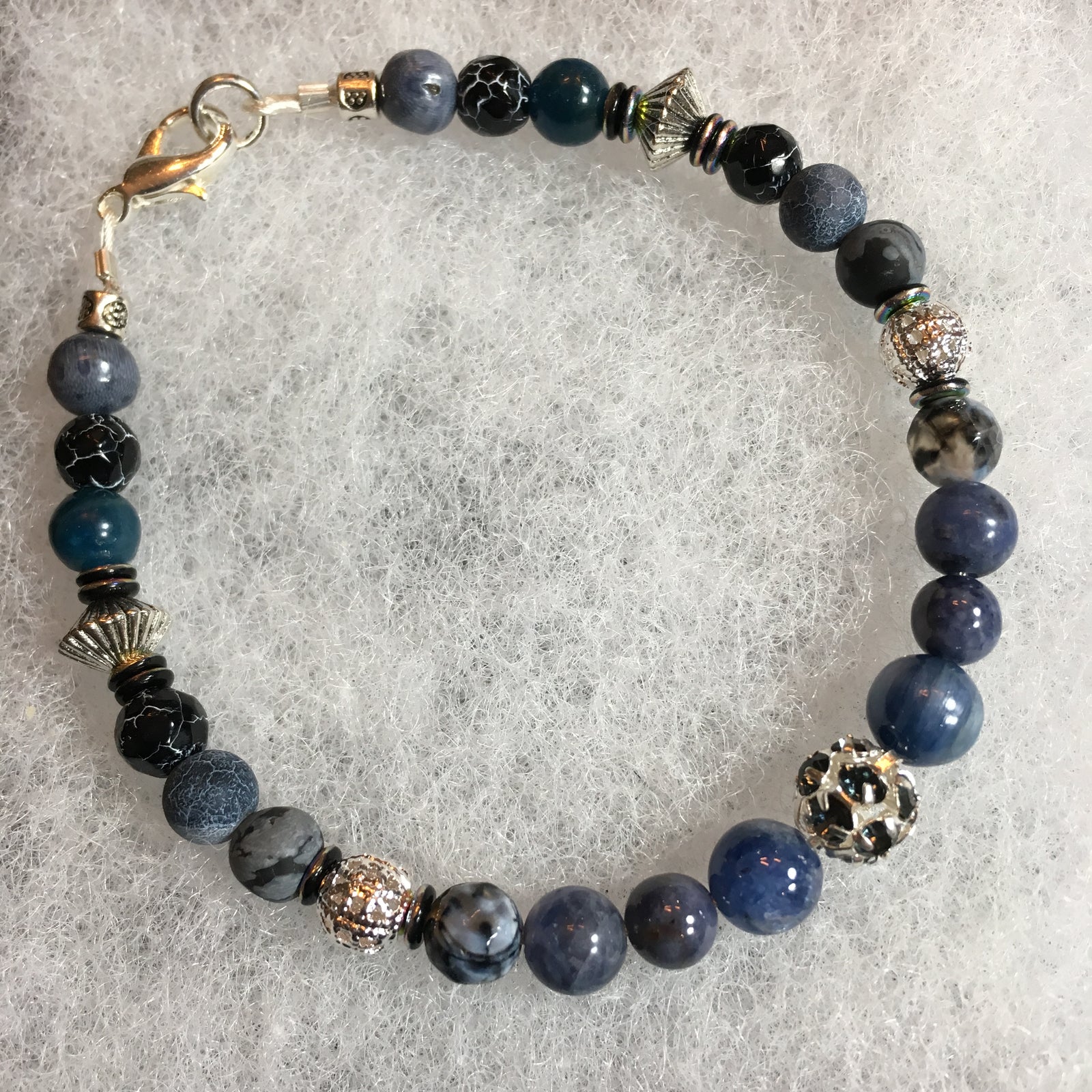 Dragon's Vein, Snowflake Obsidian, Black Crackle and Faceted Agate, Blue Sponge Coral, Apatite, Blue Sapphire, Sodalite, Kyanite Bracelet