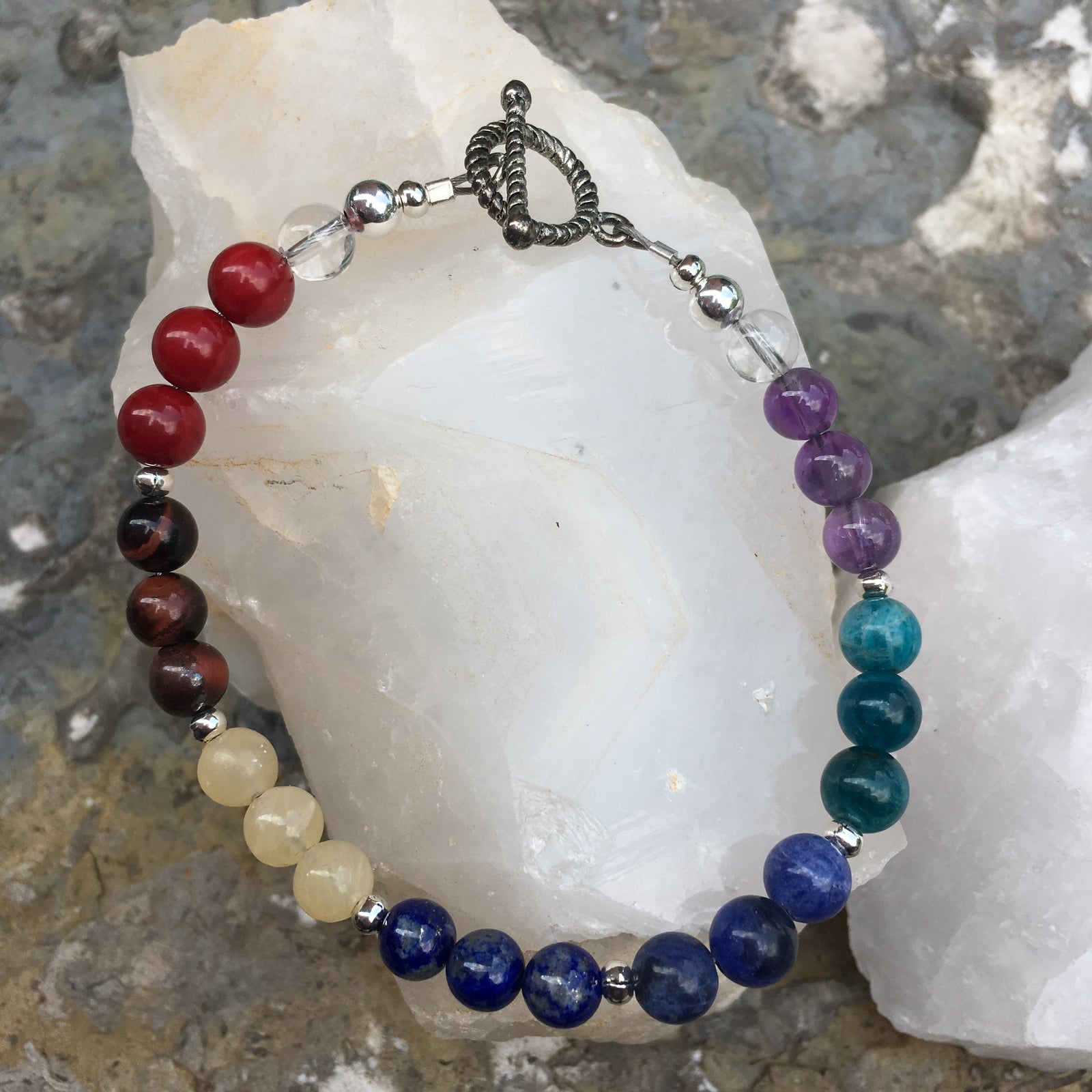 Chakra Bracelet with Toggle. Red Coral, Brecciated Jasper, Yellow Calcite, Lapis Lazuli, Sodalite, Apatite, Amethyst, Clear Quartz