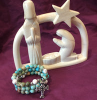 Rosary Bead Bracelet with Howlite, Rhyolite, Emperor Jasper, and Pewter Celtic Cross of Clarity