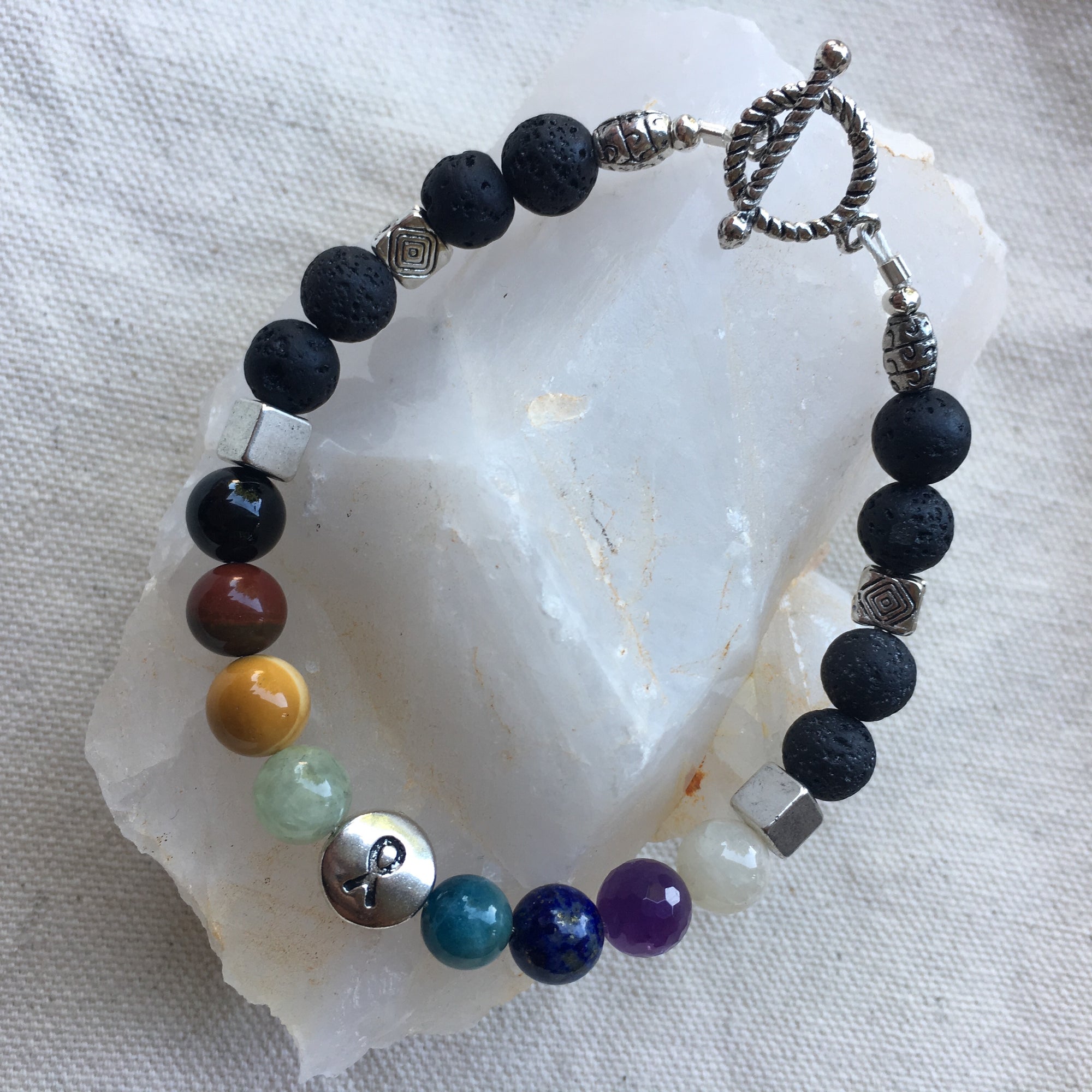 Chakra Bracelet with Lava Rock, Black Tourmaline, Polychrome Jasper, Mookaite, Green Tourmaline, Apatite, Lapis Lazuli, Amethyst, Moonstone with Brass Toggle