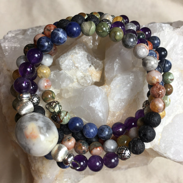Mala Chakra Bracelet: Lava Rock, Agate, Crazy Lace Agate, Rhyolite, Sodalite, Amethyst and with Crazy Lace Agate Guru Stone, on memory wire