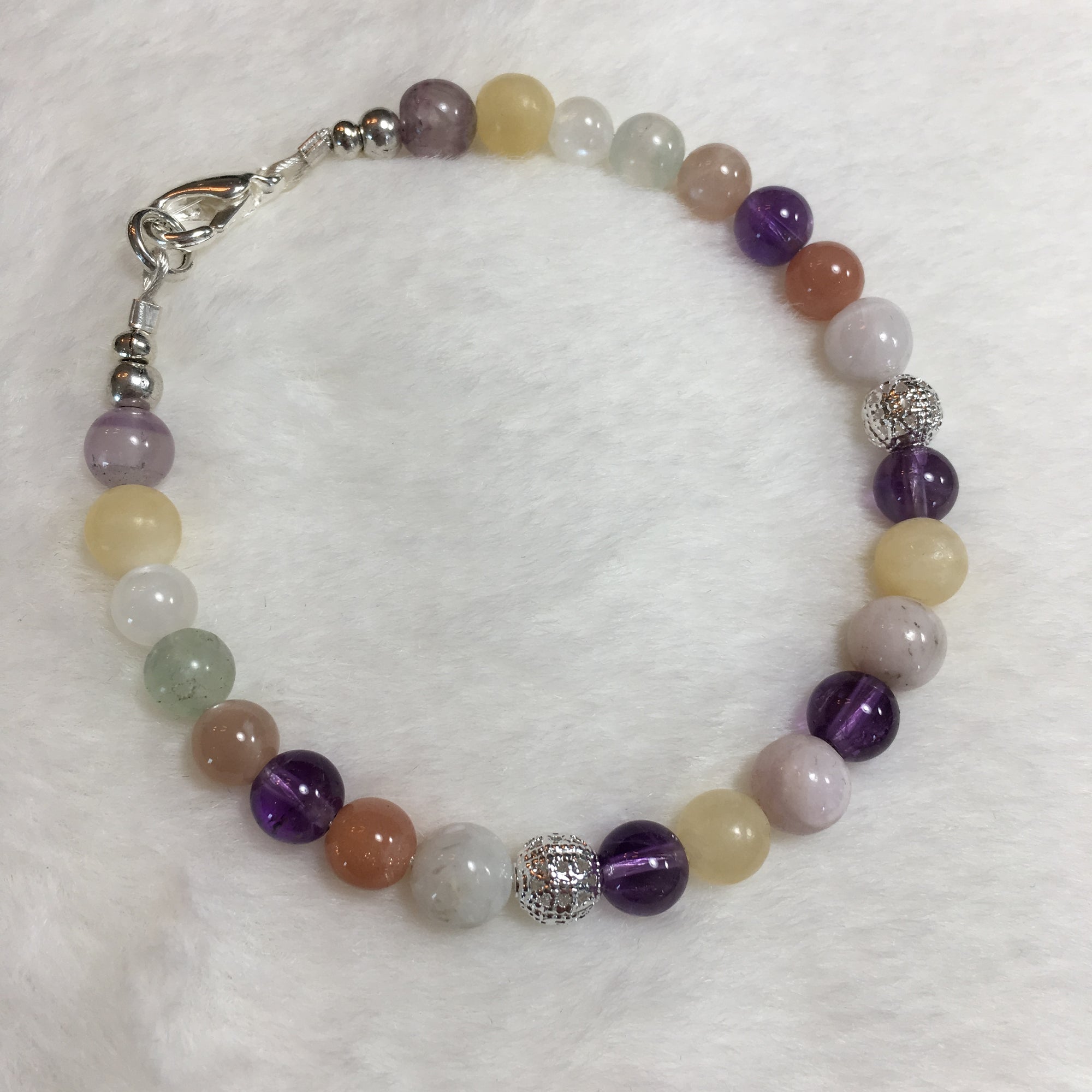 Yellow Calcite, White Moonstone, Moonstone, Sunstone Peach, Amethyst, Fluorite, Kunzite